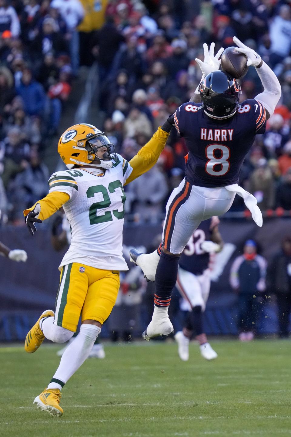 Chicago Bears' N'Keal Harry catches a pass in front of Green Bay Packers' Jaire Alexander during the second half of an NFL football game Sunday, Dec. 4, 2022, in Chicago. (AP Photo/Nam Y. Huh)