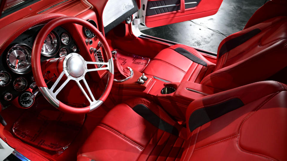 The interior is fully custom trimmed in lipstick-red leather. - Credit: Photo: Courtesy of Barrett-Jackson.