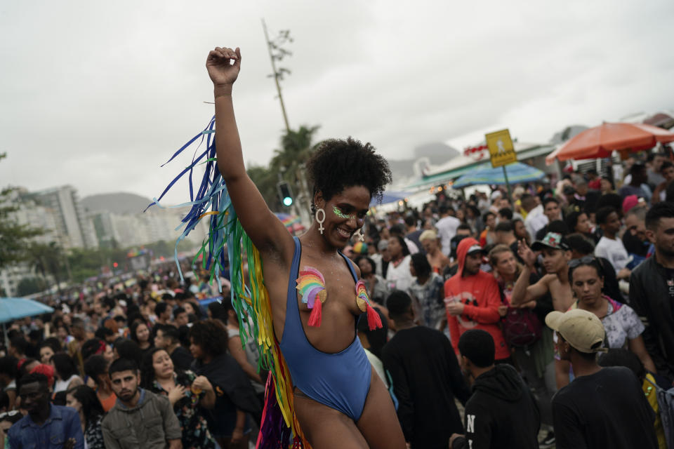 A woman performs during the annual gay pride parade along Copacabana beach in Rio de Janeiro, Brazil, Sunday, Sept. 22, 2019. The 24th gay pride parade titled this year's parade: "For democracy, freedom and rights, yesterday, today and forever." (AP Photo/Leo Correa)