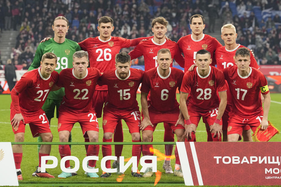 Russia starting players pose for a team photo at the beginning of the international friendly soccer match between Russia and Serbia at the Central Dynamo Stadium of Lev Yashin in Moscow, Russia, Thursday, March 21, 2024. (AP Photo/Alexander Zemlianichenko)