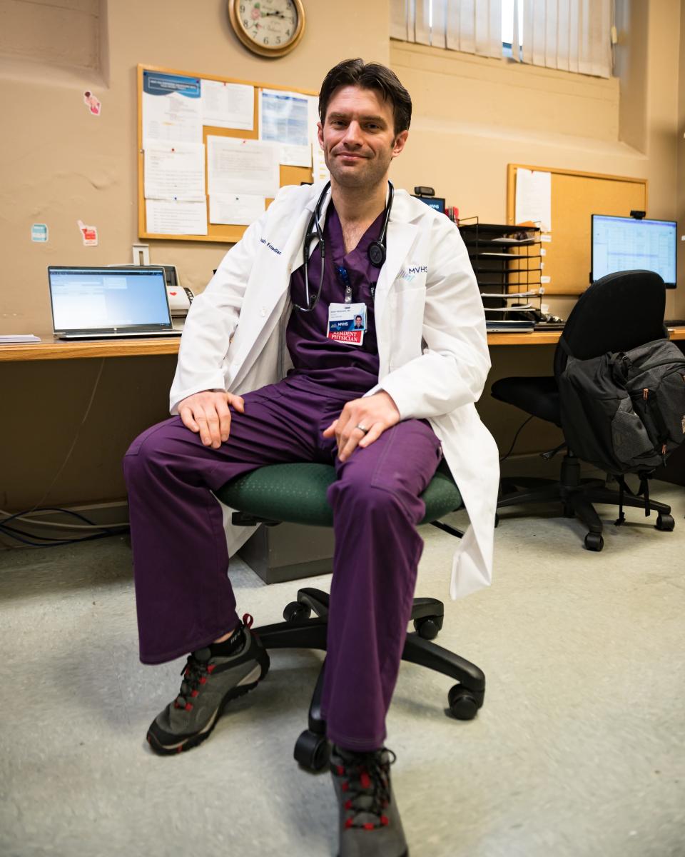 Noah Friedlan, MD, a member of the St. Elizabeth Family Medicine Residency Program, sits at his desk inside the Sister Rose Vincent Family Medicine Center at 120 Hobart St in Utica, NY on Tuesday, July 25, 2023.