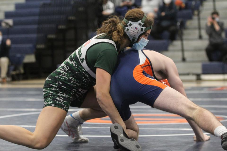 Pleasantville's Adriana Palumbo (left) wrestles against Horace Greeley's Luke Richards (right) during a meet on Jan. 18, 2022.