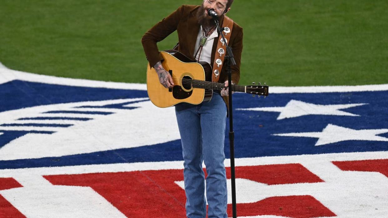 <div>Rapper Post Malone sings America the Beautiful prior to the start of Super Bowl LVIII between the San Francisco 49ers and the Kansas City Chiefs at Allegiant Stadium on February 11, 2024 in Las Vegas, Nevada.</div>