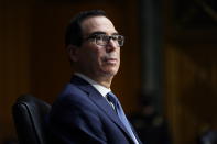 Treasury Secretary Steven Mnuchin listens during a Senate Banking Committee hearing on 'The Quarterly CARES Act Report to Congress' on Capitol Hill in Washington, Tuesday, Dec. 1, 2020. (AP Photo/Susan Walsh, Pool)