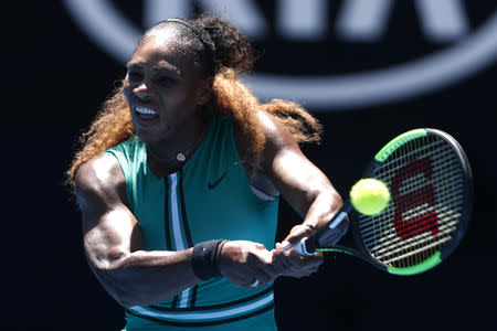 Tennis - Australian Open - Quarter-final - Melbourne Park, Melbourne, Australia, January 23, 2019. Serena Williams of the U.S. in action with Czech Republic's Karolina Pliskova. REUTERS/Edgar Su