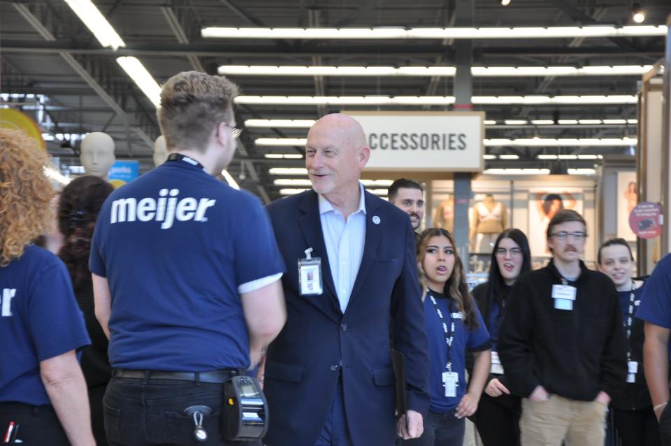 North Canton Mayor Stephan Wilder shook hands with Meijer employees during a preview of the company's new North Canton location on May 8, 2024.