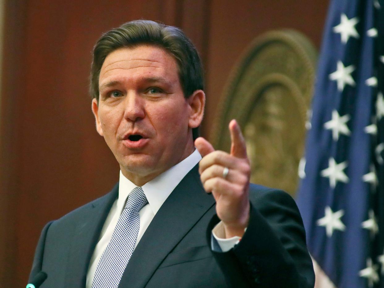 Florida Gov. Ron DeSantis gestures as he gives his State of the State address during a joint session of the Senate and House of Representatives Tuesday, March 7, 2023, at the Capitol in Tallahassee, Fla.