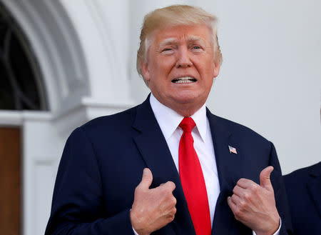 FILE PHOTO: U.S. President Donald Trump speaks to reporters at Trump's golf estate in Bedminster, New Jersey U.S. August 10, 2017. REUTERS/Jonathan Ernst/File Photo