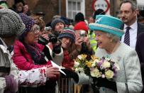 NORFOLK, ENGLAND - FEBRUARY 6: Queen Elizabeth II is greeted by wellwishers during a visit to Kings Lynn Town Hall on February 6, 2012 in Norfolk, England. Today is Accession Day, with the Queen celebrating 60 years to the day since she became Monarch. (Photo by Chris Radburn - WPA Pool/Getty Images)