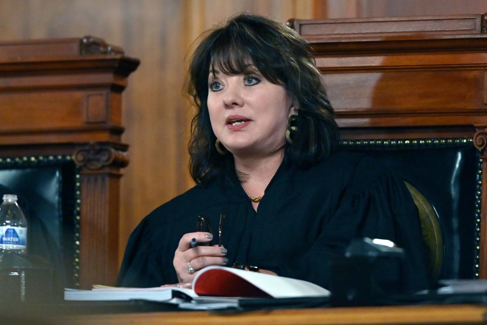 Kentucky Supreme Court Justice Debra Lambert asks a question as the court hears arguments whether to temporarily pause the state's abortion ban in Frankfort, Ky., Tuesday, Nov. 15, 2022. (AP Photo/Timothy D. Easley)