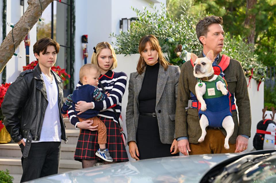 (L to R) Brady Noon as Wyatt, Emma Myers as CC, Lincoln Alex Sykes and Theodore Brian Sykes as Baby Miles, Jennifer Garner as Jess and Ed Helms as Bill in "Family Switch."