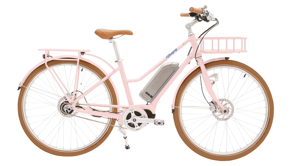 pink electric bike with basket