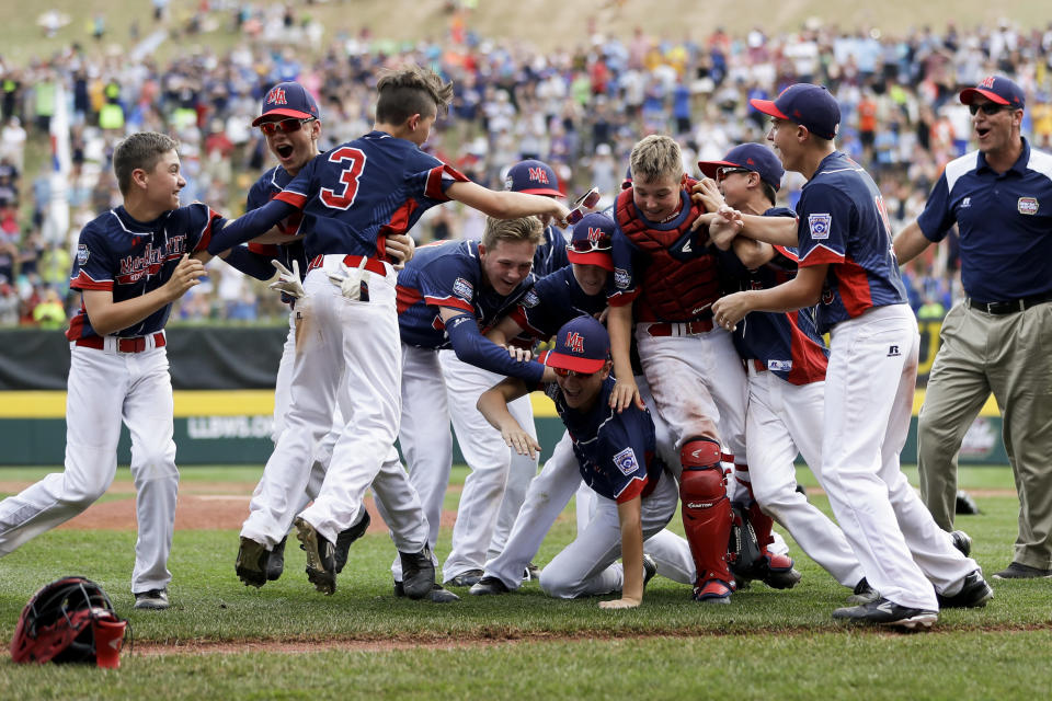 Endwell, N.Y., players celebrate after winning the Little League World Series Championship baseball game against South Korea, Sunday, Aug. 28, 2016, in South Williamsport, Pa. (AP Photo/Matt Slocum)