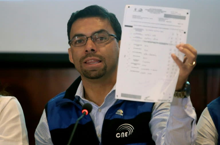 The president of the Ecuadorean National Electoral Council, Juan Pozo, speaks in Quito on February 20, 2017, about the preliminary results of Sunday's elections in Ecuador