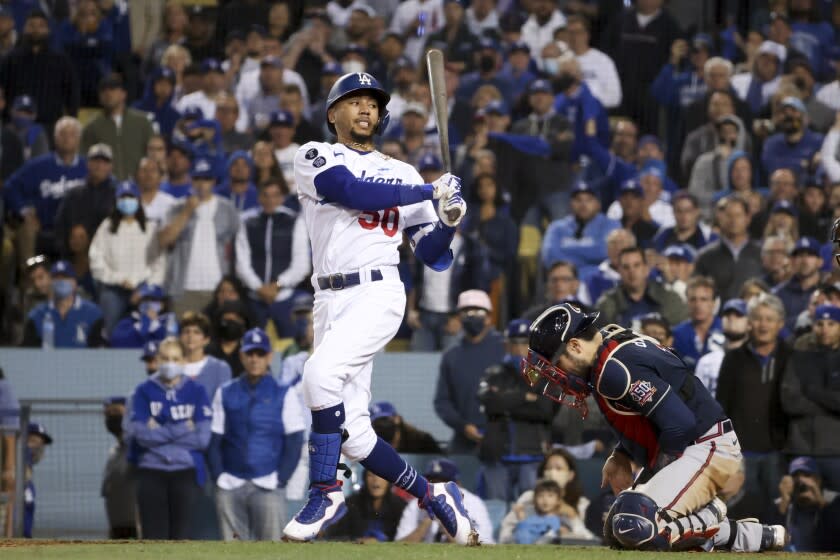 Los Angeles, CA - October 20: Los Angeles Dodgers' Mookie Betts looks back after striking out.