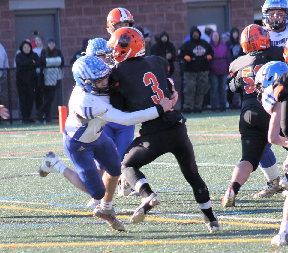 Somersworth's Thomas Rees was part of a stout defense that forced six turnovers during Saturday's Division IV championship game against Newport.