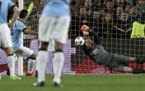 Barcelona's goalkeeper Marc-Andr? ter Stegen saves a penalty from Manchester City's Sergio "Kun" Aguero during their Champions League round of 16 second leg soccer match at Camp Nou stadium in Barcelona March 18, 2015. REUTERS/Gustau Nacarino (SPAIN - Tags: SPORT SOCCER TPX IMAGES OF THE DAY)