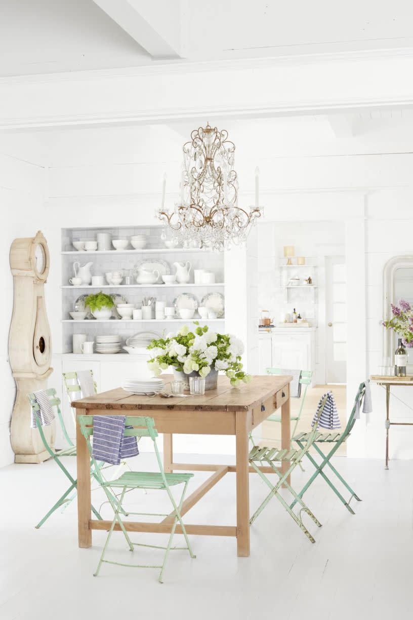 <p>White walls, ceilings, and floors create a clean backdrop for vintage-inspired decor. Pro tip: To keep painted floors looking pristine, consider priming and painting them annually. They'll need a thorough cleaning before doing so. The floor is painted <a href="https://www.farrow-ball.com/paint-colours/strong-white" rel="nofollow noopener" target="_blank" data-ylk="slk:Strong White by Farrow & Ball;elm:context_link;itc:0;sec:content-canvas" class="link ">Strong White by Farrow & Ball</a>.<br></p>