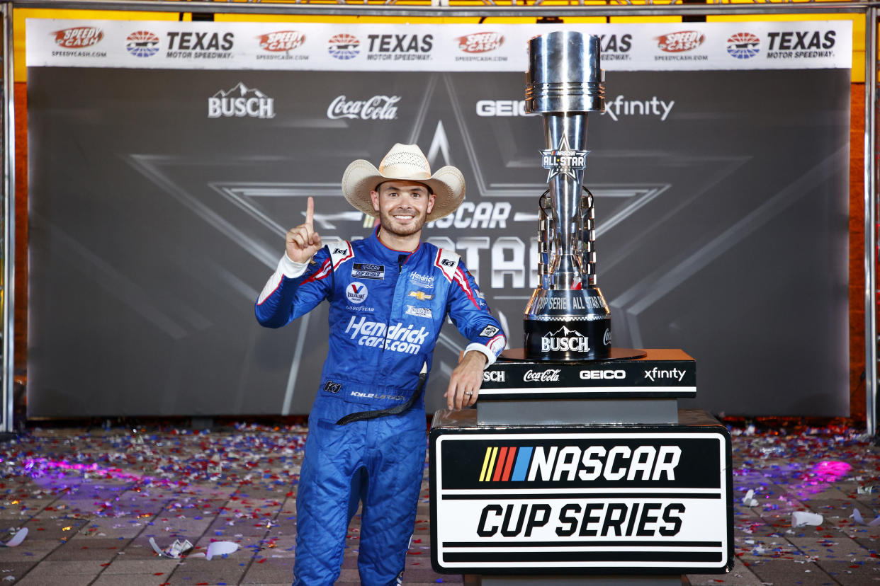 FORT WORTH, TEXAS - JUNE 13: Kyle Larson, driver of the #5 HendrickCars.com Chevrolet, celebrates in victory lane after winning 
the NASCAR All-Star Race at Texas Motor Speedway on June 13, 2021 in Fort Worth, Texas. (Photo by Jared C. Tilton/Getty Images)