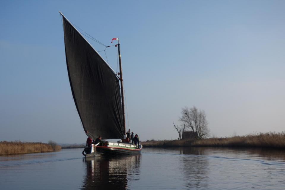 Eastern Daily Press: Norfolk wherry boat Maud with her distinctive black sail 