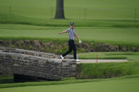 Ryosuke Kinoshita, of Japan, walks on the second hole during a practice round for the PGA Championship golf tournament, Tuesday, May 17, 2022, in Tulsa, Okla. (AP Photo/Eric Gay)