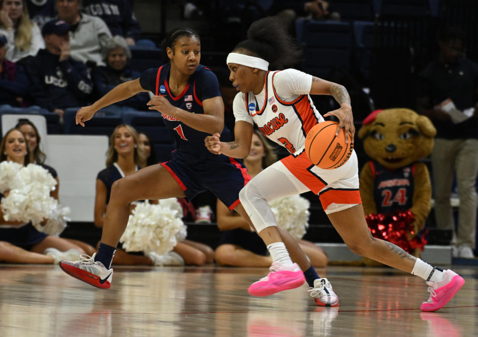 STORRS, CONNECTICUT - MARCH 23: Courtney Blakely #1 of the University of Arizona Wildcats defends Dyaisha Fair #2 of the Syracuse University Orange during the first round of the 2024 NCAA Women's Basketball Tournament held at Harry A. Gampel Pavilion on March 23, 2024 in Storrs, Connecticut. (Photo by Sean Elliot/NCAA Photos via Getty Images)