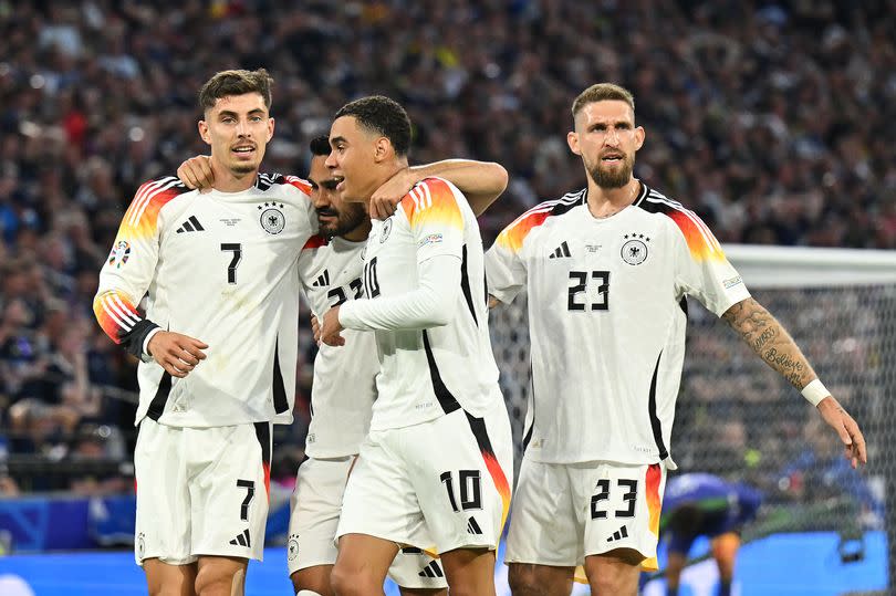 Jamal Musiala of Germany celebrates scoring his team's second goal with teammates Kai Havertz, Ilkay Gundogan and Robert Andrich during the UEFA Euro 2024 group stage match against Scotland
