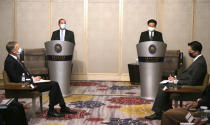 U.S. Health and Human Services Secretary Alex Azar, second from left, speaks at the start of a meeting with Taiwanese Foreign Minister Joseph Wu, standing at right, in Taipei, Taiwan Tuesday, Aug. 11, 2020. Azar met with Wu on Tuesday during the highest-level visit by an American Cabinet official since the break in formal diplomatic ties between Washington and Taipei in 1979. (AP Photo/Chiang Ying-ying)