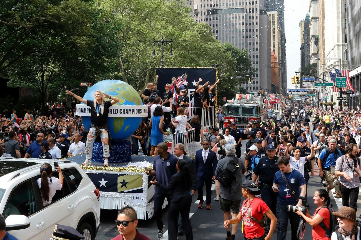 The U.S. women's soccer team celebrates in a parade along the Canyon of Heroes in lower Manhattan, New York.