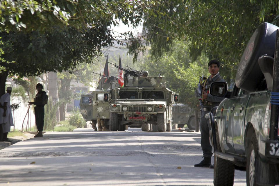 Afghan security forces arrive near the site of a suicide bombing and gun battle as militants attempted to storm a government office, in Jalalabad, the provincial capital of eastern Afghanistan, Wednesday, Sept. 18, 2019. The violence comes as Afghanistan prepares for presidential elections on Sept. 28, a vote the Taliban vehemently oppose. (AP Photo)