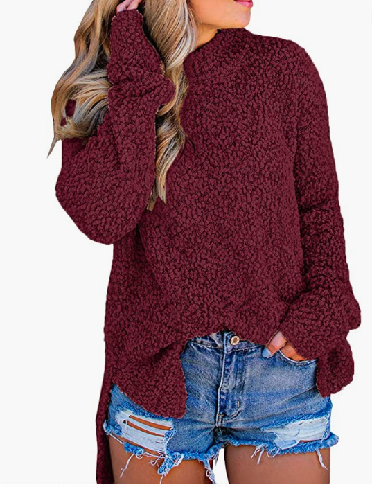 woman with long blonde hair wears Imily Bela Womens Fuzzy Knitted Sweater Sherpa Fleece Side Slit Full Sleeve Jumper Outwears in wine red with denim cutoff shorts