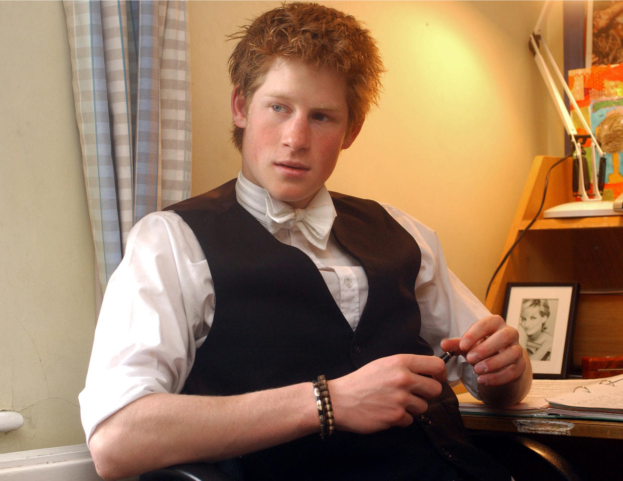 Prince Harry sits in his room at Eton College