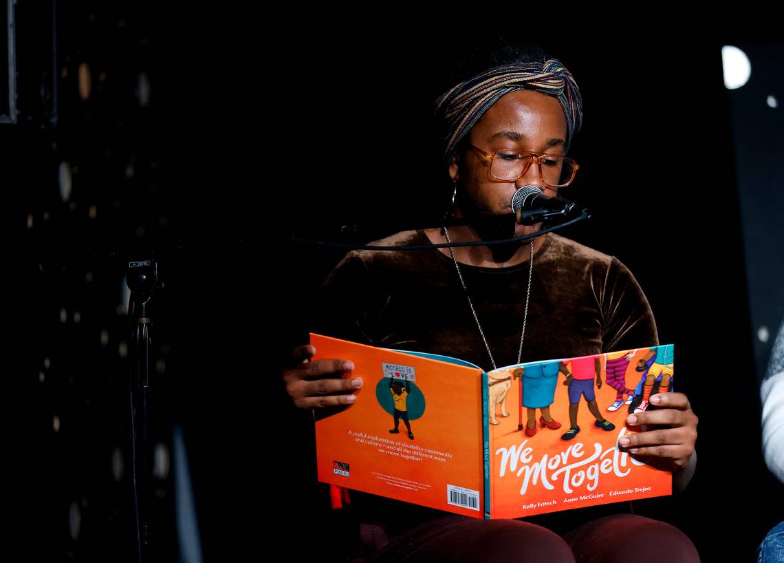 Stormie Daie reads a passage from a book entitled, “We Move Together” during a press conference held at the Pinhook on Thursday, Dec. 8, 2022, addressing the Dec. 3rd drag show in Southern Pines, N.C. and power outages in Moore County. Kaitlin McKeown/kmckeown@newsobserver.com