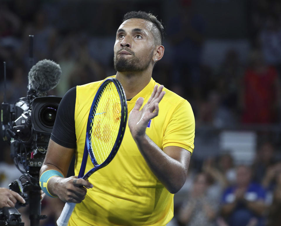 Nick Kyrgios of Australia reacts after winning his match against Jan-Lennard Struff of Germany at the ATP Cup tennis tournament in Brisbane, Australia, Friday, Jan. 3, 2020. (AP Photo/Tertius Pickard)