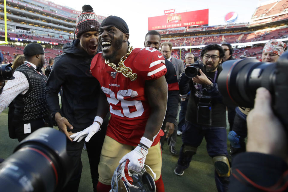 San Francisco 49ers running back Tevin Coleman (26) celebrates after the 49ers beat the Minnesota Vikings 27-10 in an NFL divisional playoff football game, Saturday, Jan. 11, 2020, in Santa Clara, Calif. (AP Photo/Marcio Jose Sanchez)