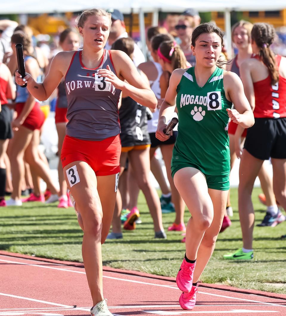 Norwayne's Jaylee Wingate passes Mogadore's Katie Lane to cap a run from 14th place to second place in the 3200 relay.