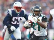 FILE PHOTO: Jan 21, 2018; Foxborough, MA, USA; Jacksonville Jaguars running back Leonard Fournette (27) runs the ball against the New England Patriots during the second quarter in the AFC Championship Game at Gillette Stadium. Mark J. Rebilas-USA TODAY Sports