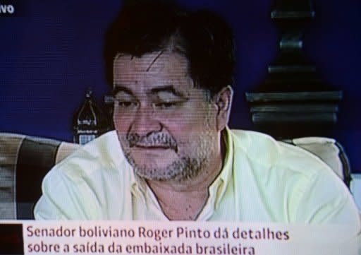 El encargado de negocios de la embajada brasileña en La Paz, Eduardo Saboia, admitió que ayudó al senador opositor boliviano Roger Pinto, que estuvo refugiado 15 meses en la legación diplomática, a fugarse el fin de semana a Brasil, donde tiene asilo político. (AFP/Globo News | )