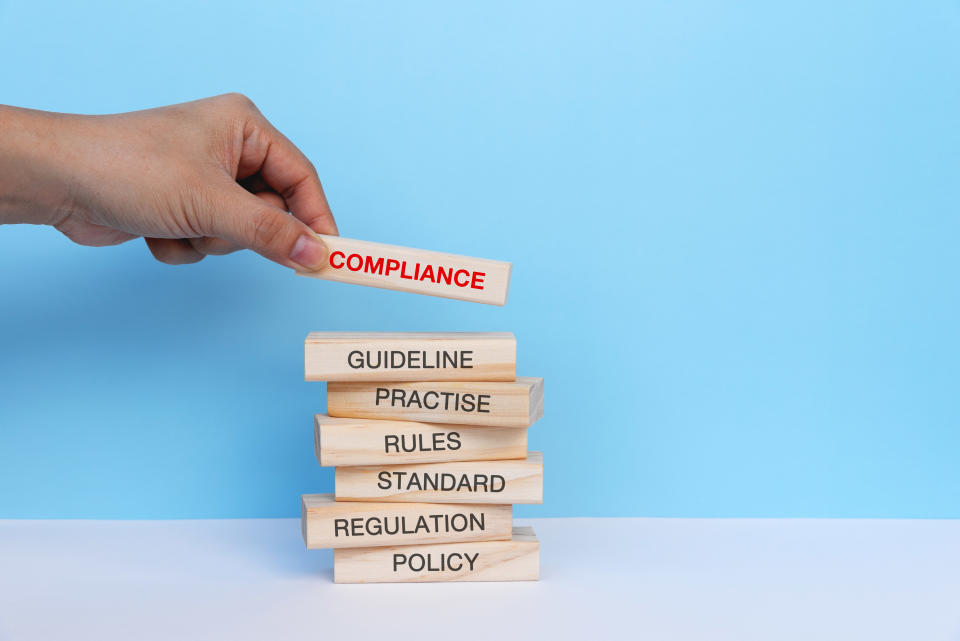 Building blocks with "compliance" at the top