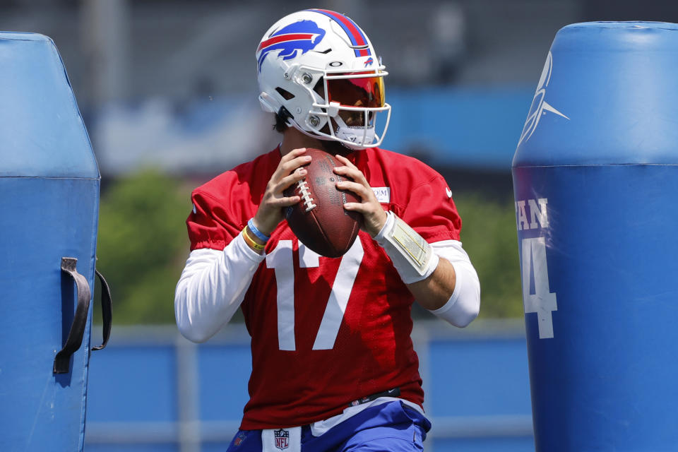 Buffalo Bills quarterback Josh Allen (17) runs a drill during NFL football practice in Orchard Park, N.Y., Tuesday, May 30, 2023. (AP Photo/Jeffrey T. Barnes)