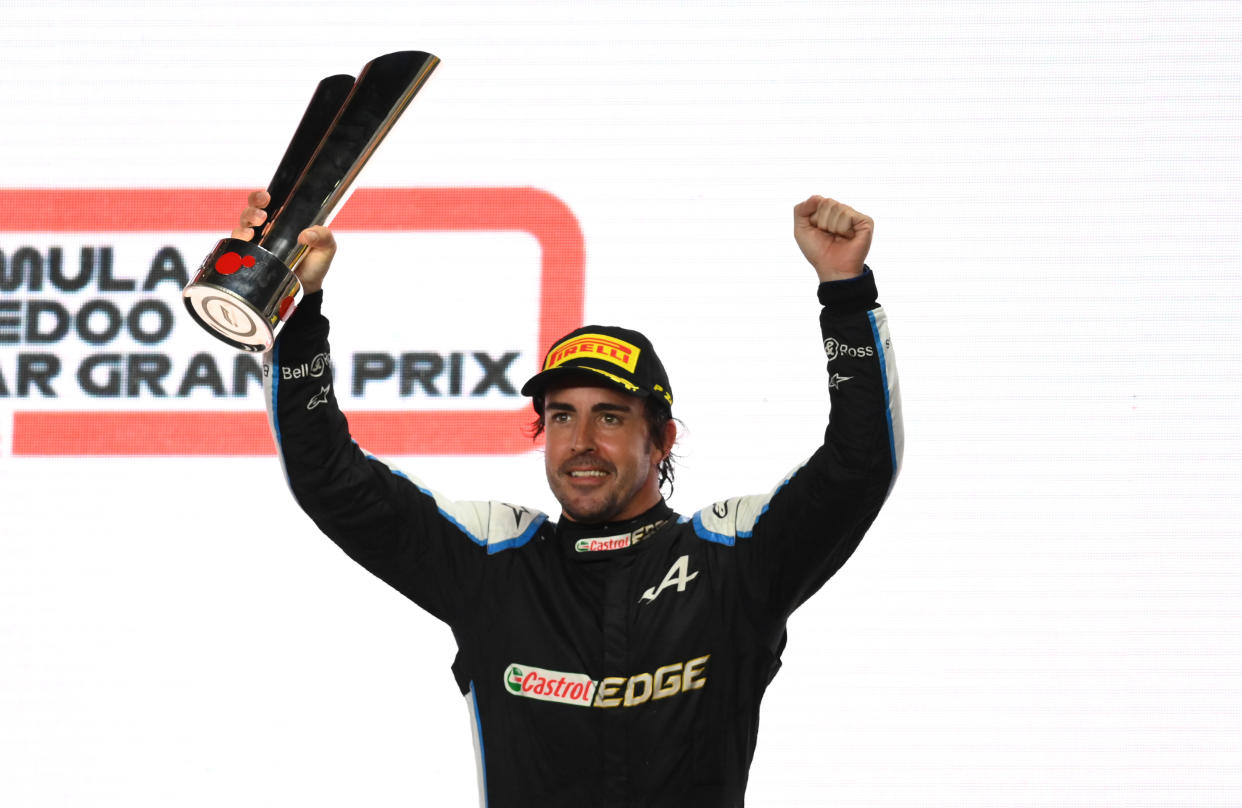 DOHA, QATAR - NOVEMBER 21: Third placed Fernando Alonso of Spain and Alpine F1 Team celebrates on the podium during the F1 Grand Prix of Qatar at Losail International Circuit on November 21, 2021 in Doha, Qatar. (Photo by Clive Mason/Getty Images)