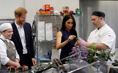 The Duke and Duchess get to touch, taste and smell native herbs and spices during a visit to the Mission Australia restaurant - Credit: Phil Noble/Reuters