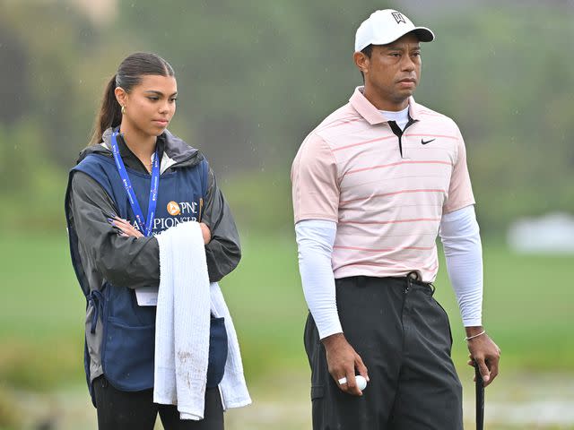 <p>Ben Jared/PGA TOUR/Getty</p> Tiger Woods and Sam Woods on the fifth green during the first round of the PNC Championship on December 16, 2023 in Orlando, Florida.