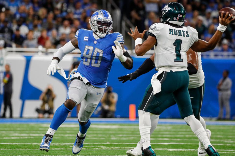 Lions defensive end Michael Brockers looks to tackle Eagles quarterback Jalen Hurts during the first half on Sunday, Sept. 11, 2022, at Ford Field.