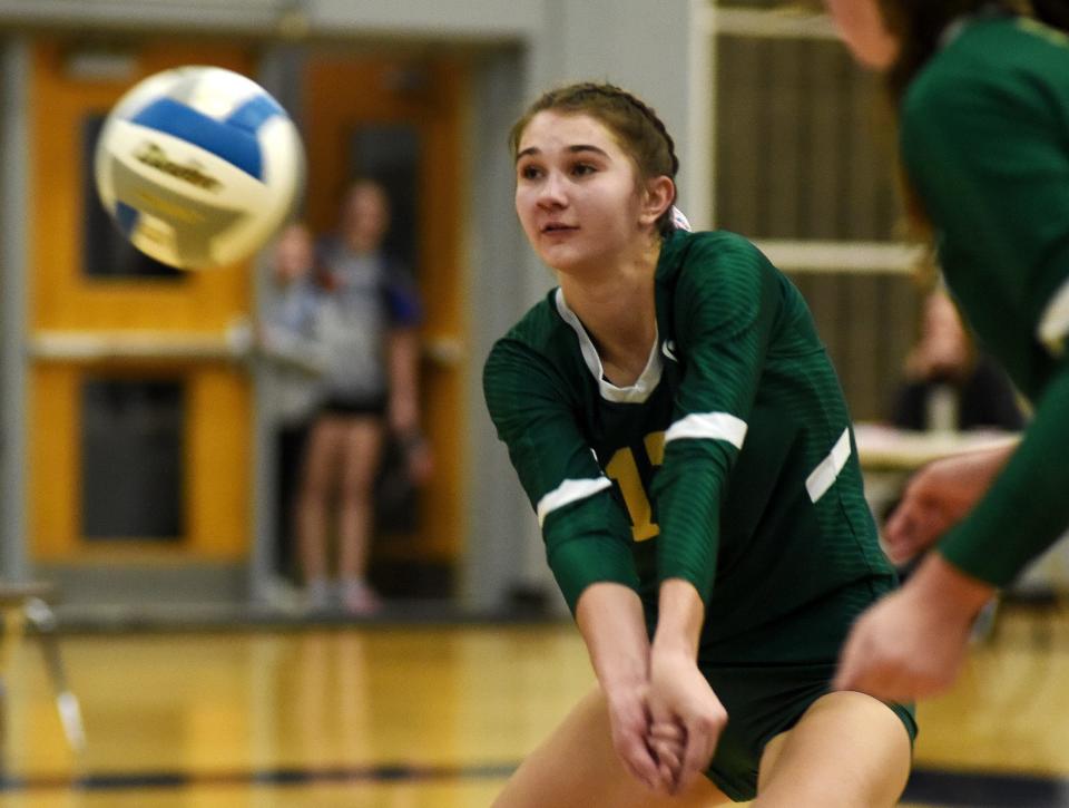 Madeline Dettling of SMCC after taking a hit to the nose comes back with this pass as they beat Plymouth Christian in 3 sets of the Division 3 Quarterfinals at Ypsilanti Lincoln High School Tuesday, November 14, 2023.