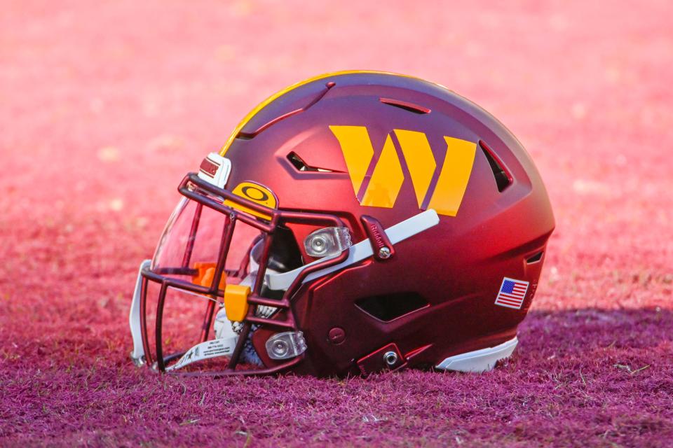 Washington Commanders helmet on the field before the game against the Cleveland Browns at FedExField.