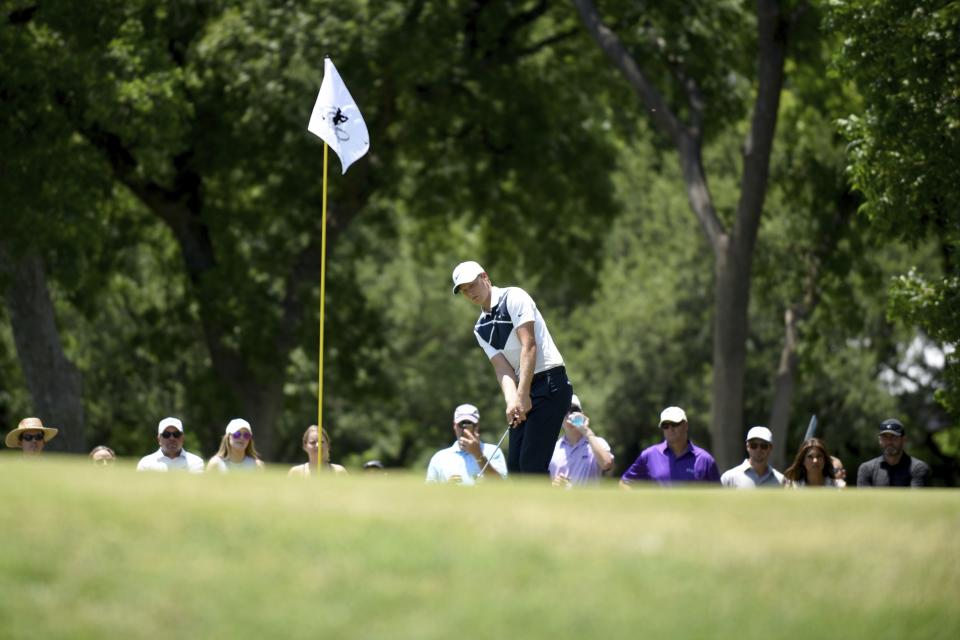 Cam Davis, of Australia, putts on the second green during the third round of the Charles Schwab Challenge golf tournament at the Colonial Country Club, Saturday, May 28, 2022, in Fort Worth, Texas. (AP Photo/Emil Lippe)