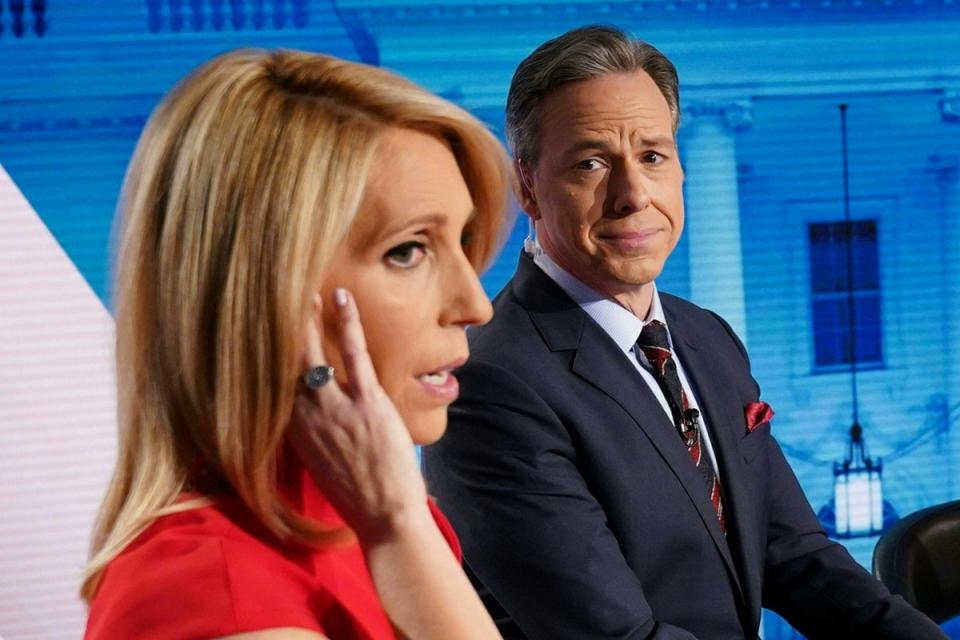 CNN’s Dana Bash and Jake Tapper in the studio before the start of the 11th Democratic Party 2020 presidential debate with former Vice-President Joe Biden and Vermont Senator Bernie Sanders in a CNN Washington Bureau studio in Washington, DC on March 15, 2020 (AFP via Getty Images)