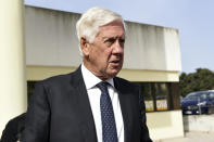 Italian lawyer for former Catalan leader Carles Puigdemont, Agostinangelo Marras speaks to reporters outside a court in Sassari, in Sardinia, Italy, Friday, Sept. 24, 2021. Puigdemont, sought by Spain for a failed 2017 secession bid, on Friday awaited his opportunity to appear in court to argue against extradition, a day after Italian police detained him in Sardinia, an Italian island with strong Catalan cultural roots and its own independence movement. (AP Photo/Gloria Calvi)