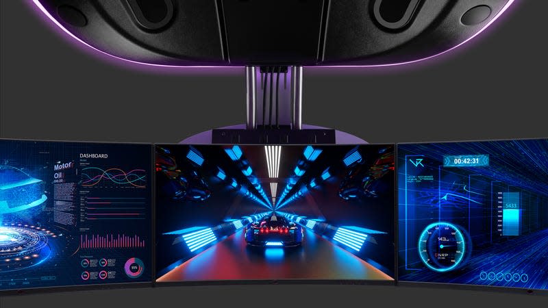 The Cooler Master Orb X shown with a trio of hanging 27-inch monitors.